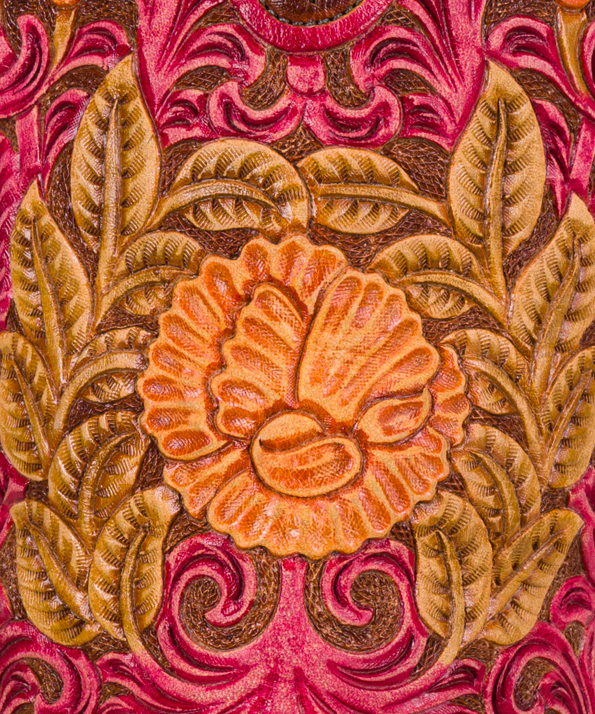 Hand-tooled prickly pear floral pattern on the vegetable-tanned calfskin top