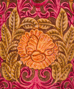 Hand-tooled prickly pear floral pattern on the vegetable-tanned calfskin top
