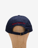 Back of the navy Flying Z Ball Cap with red detailing, showing the adjustable closure