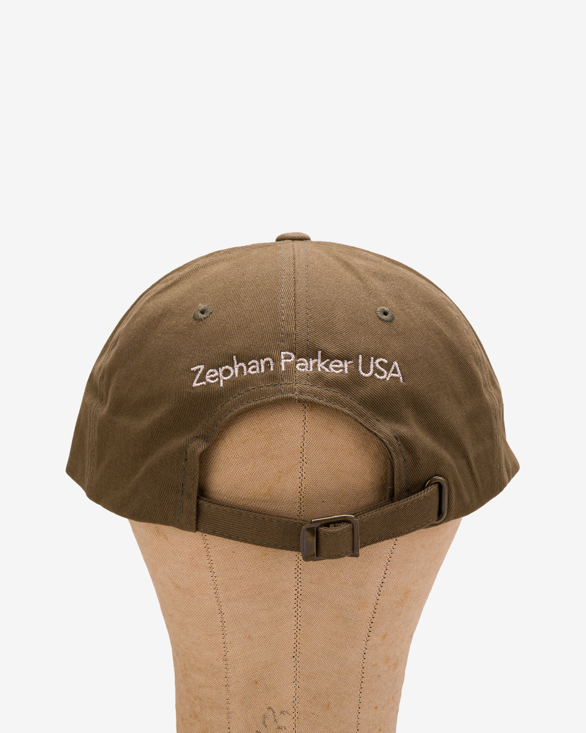Back of the olive Flying Z Ball Cap showing the adjustable closure