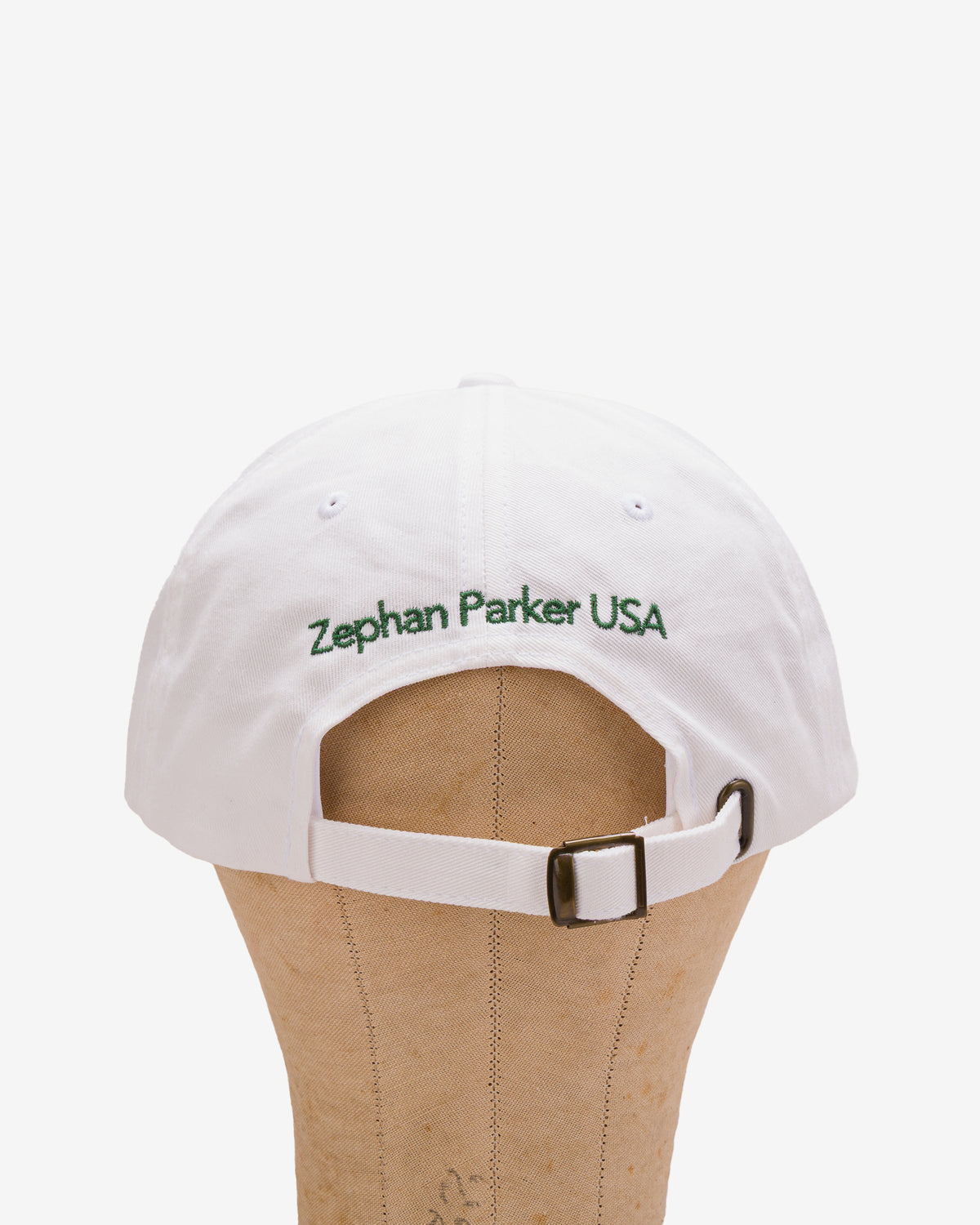 Back of the white Flying Z Ball Cap showing the adjustable closure
